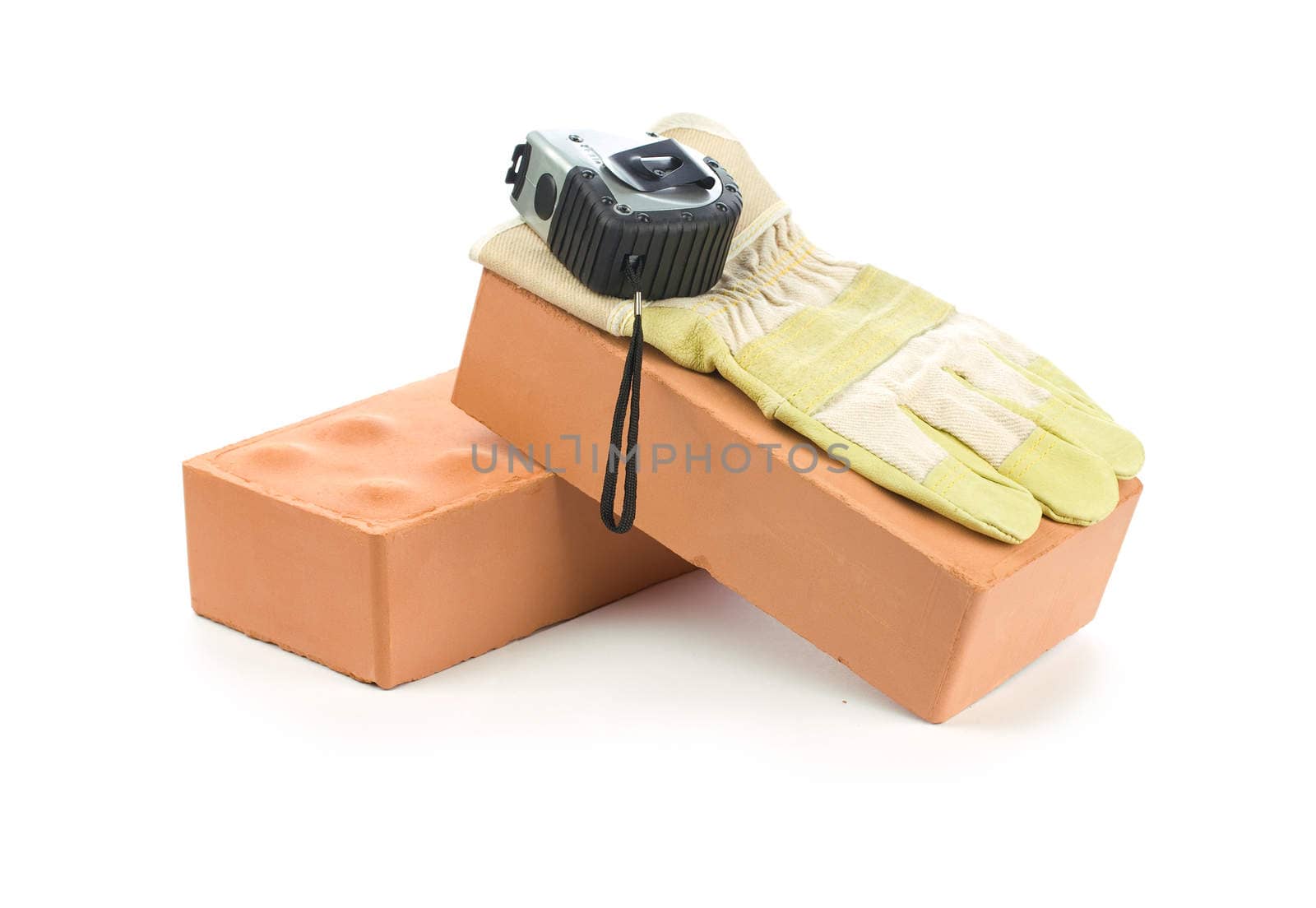 glove and tapeline on bricks