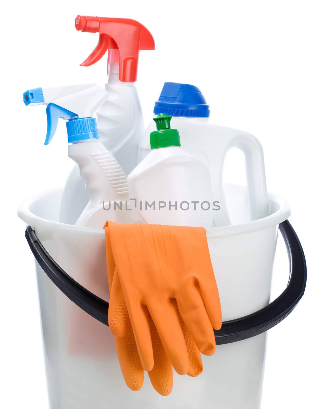 cleaning bottles in white bucket
