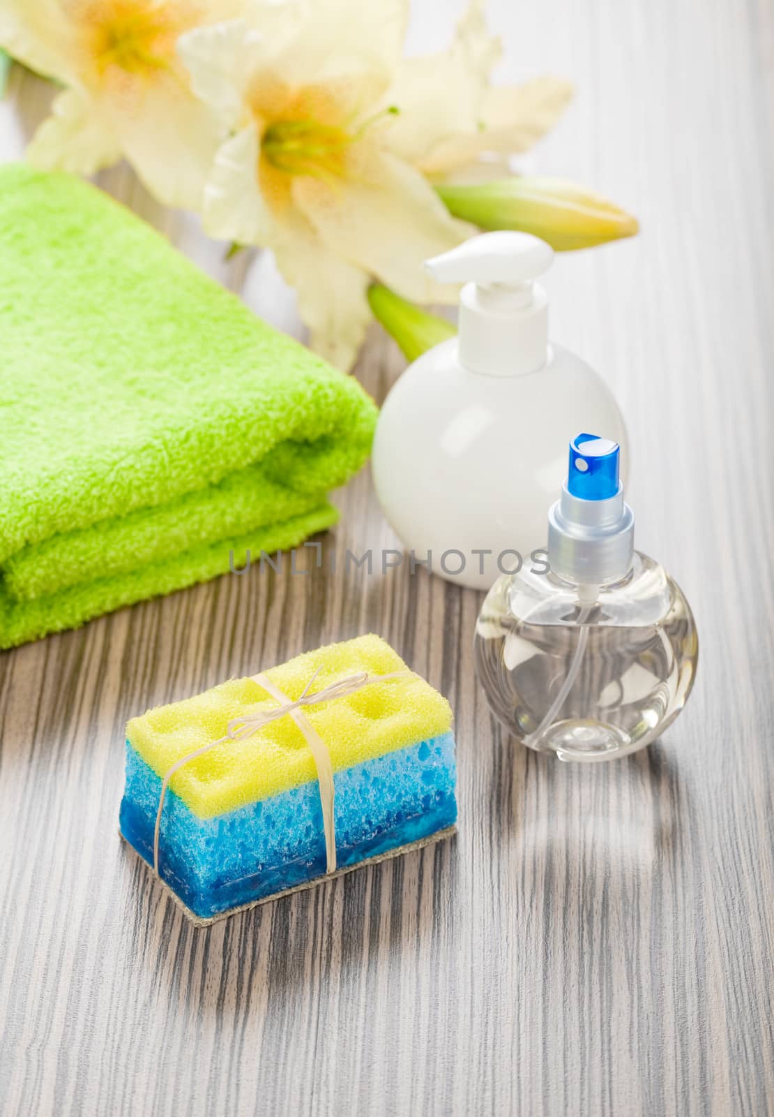 collection of bath articles and flower