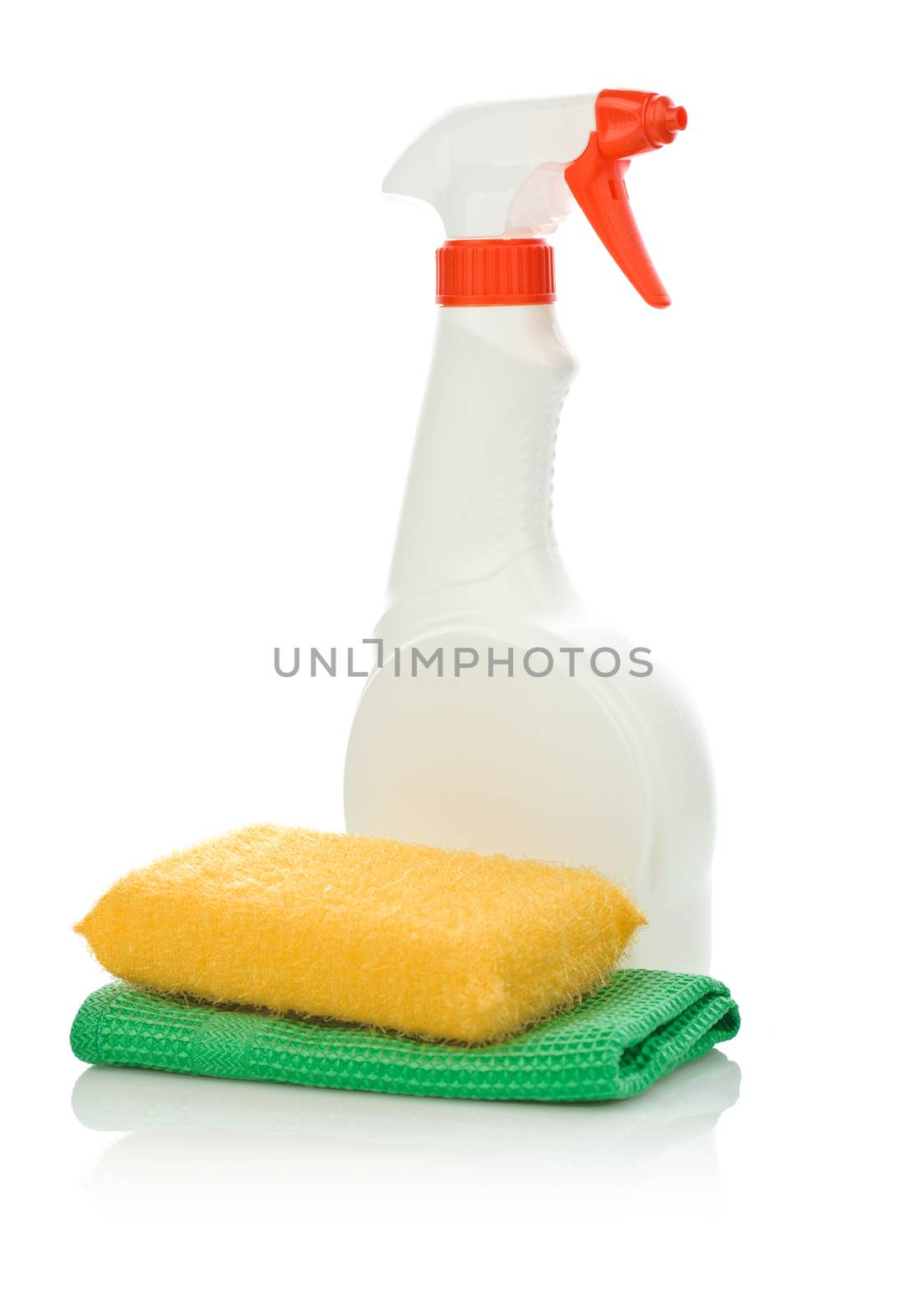 sponge on a napkin and white bottle 