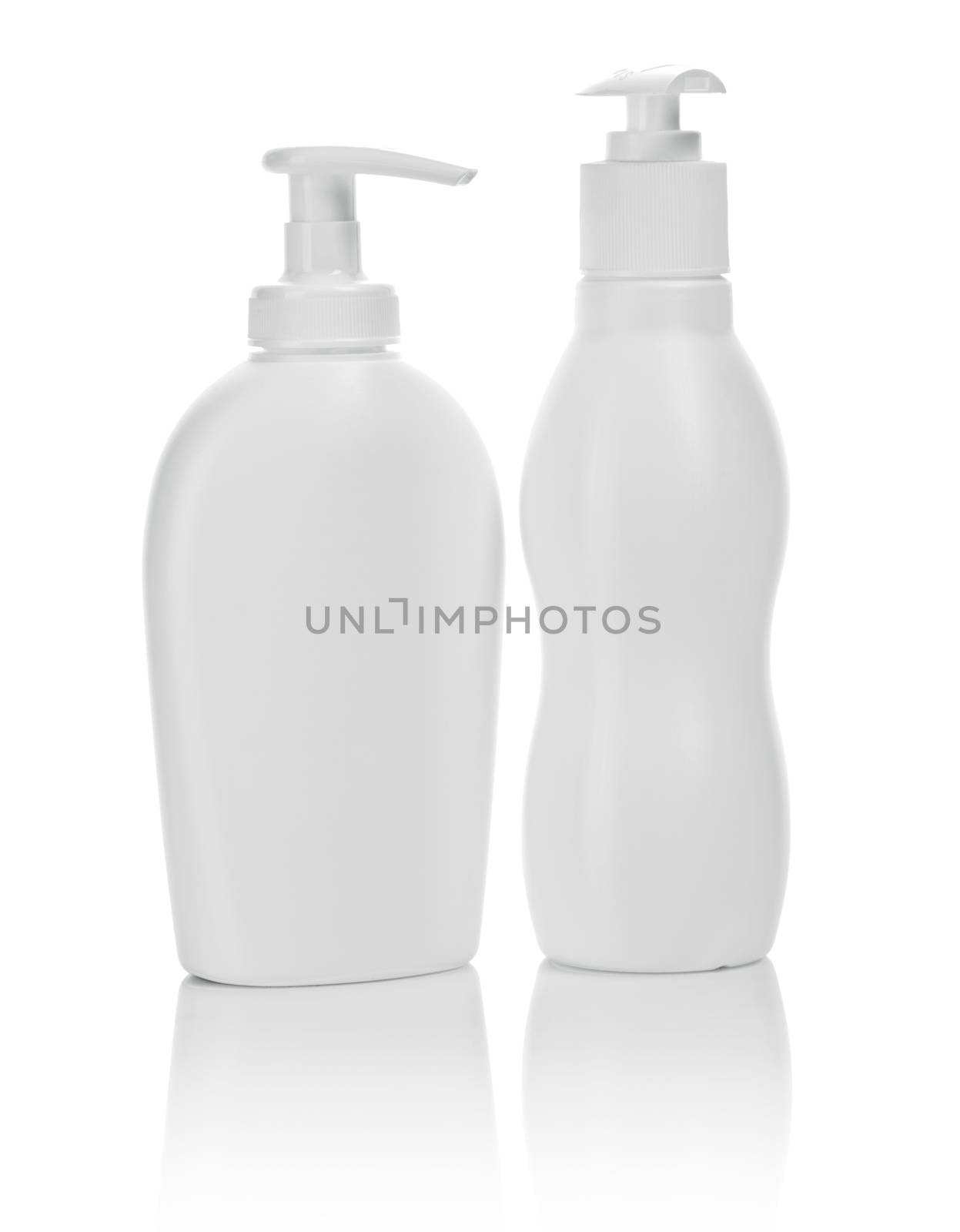 two white cosmetical bottles isolated