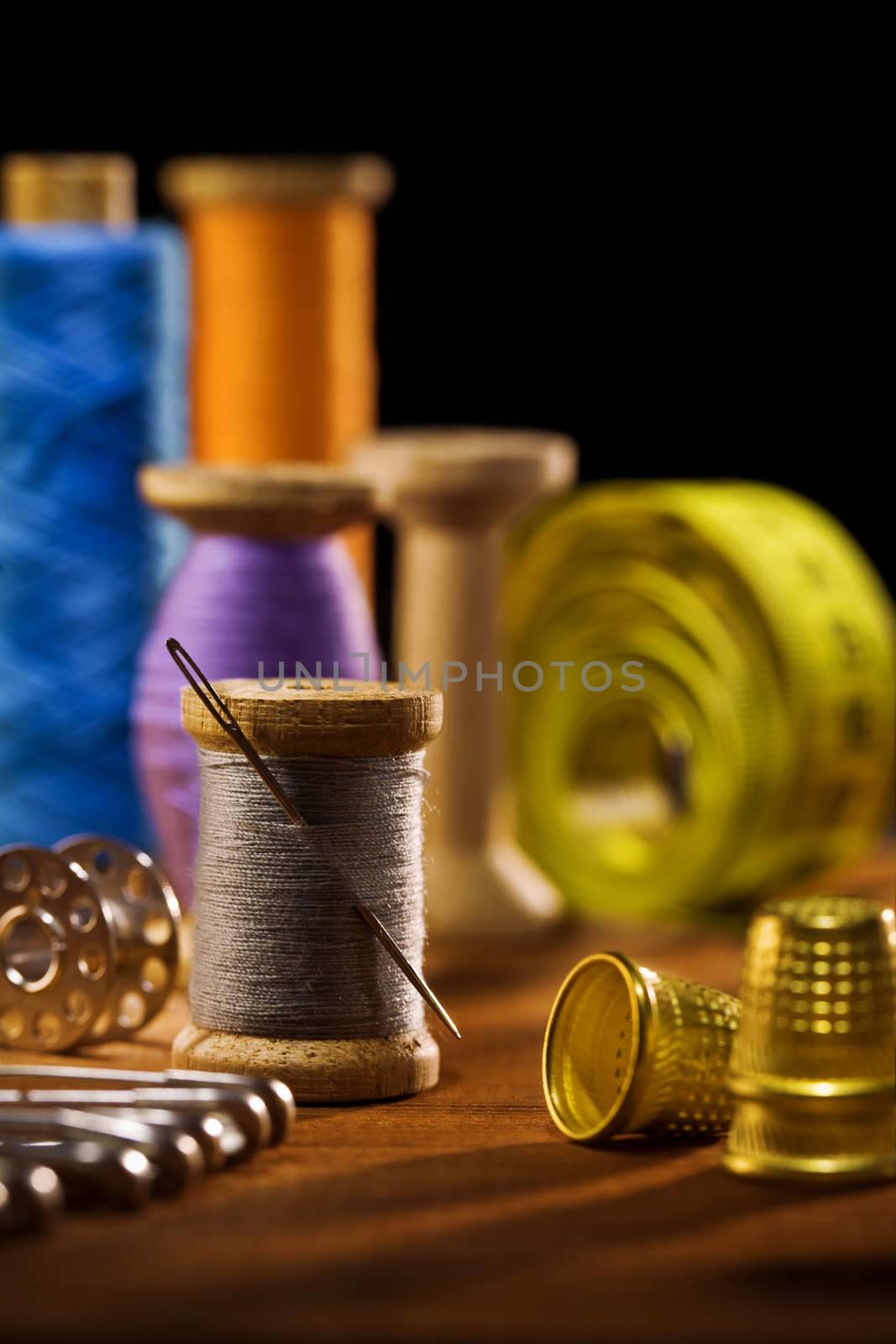 sewing items on brown wooden bards