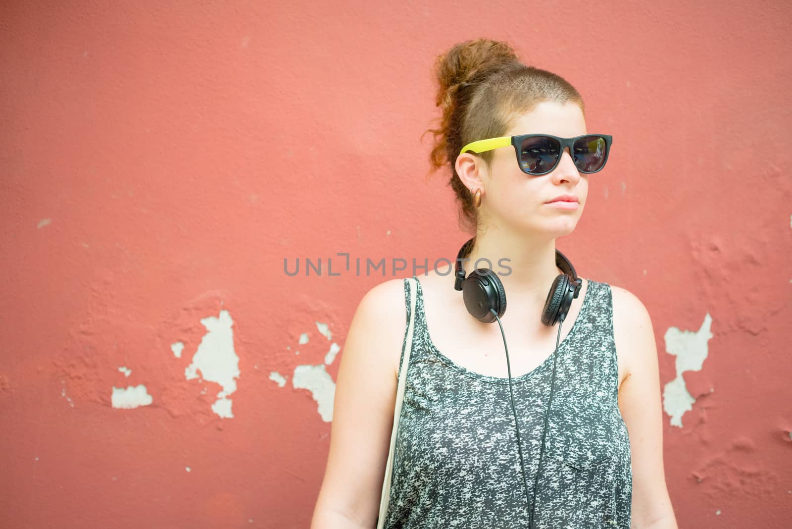 beautiful stylish modern young woman in the city