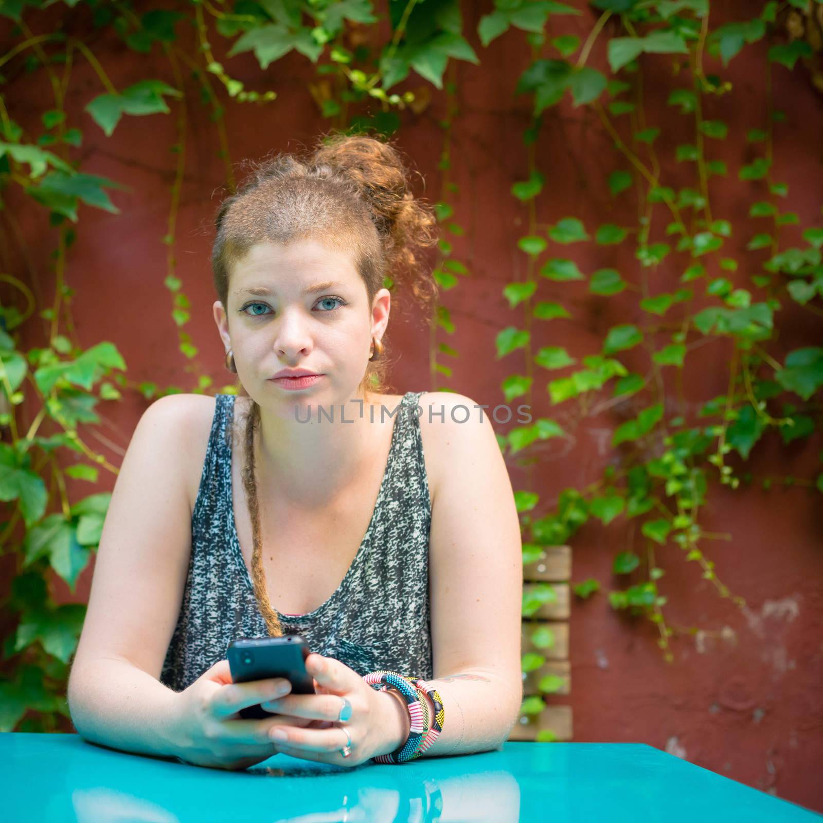 beautiful stylish modern young woman on the phone  by peus