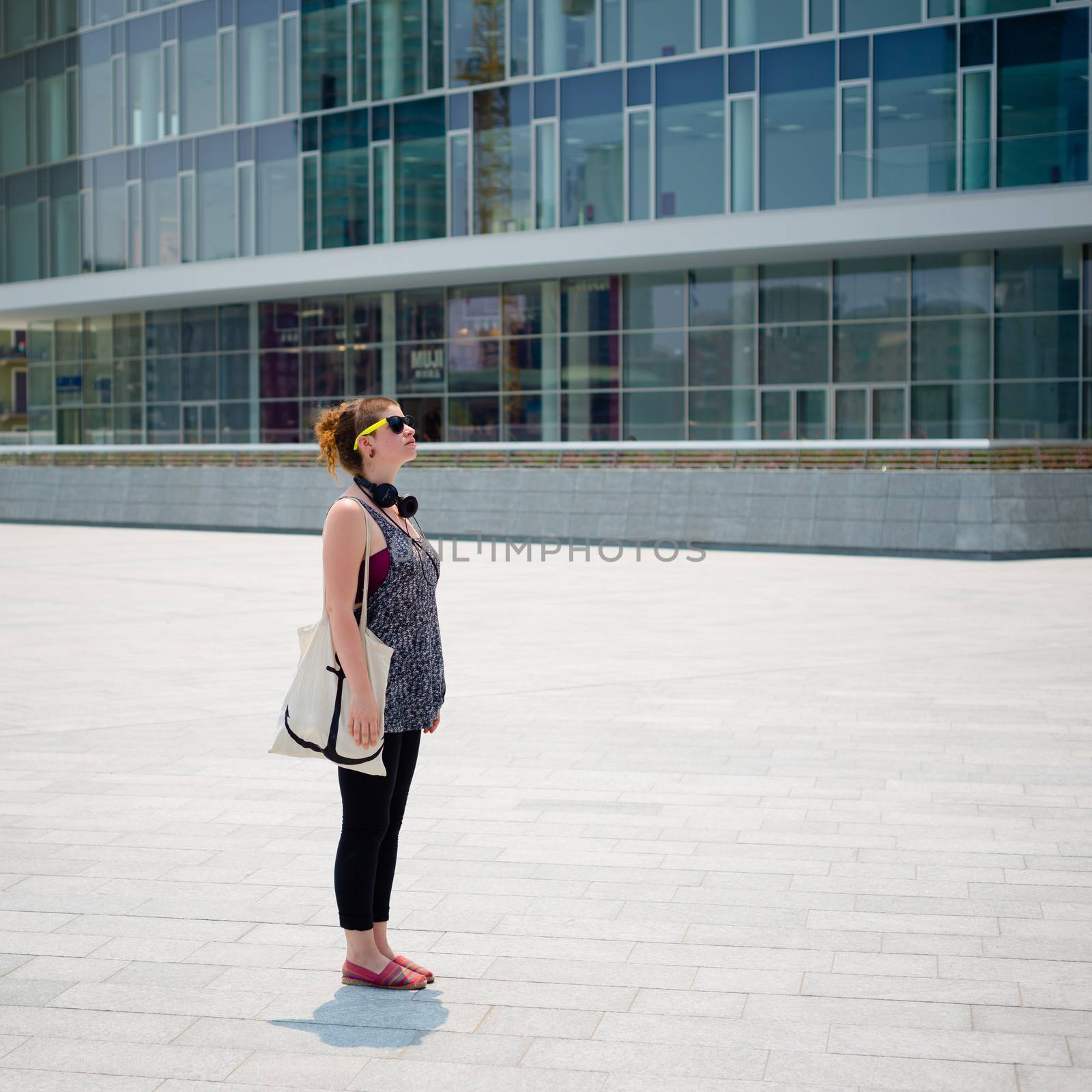 beautiful stylish modern young woman in the city