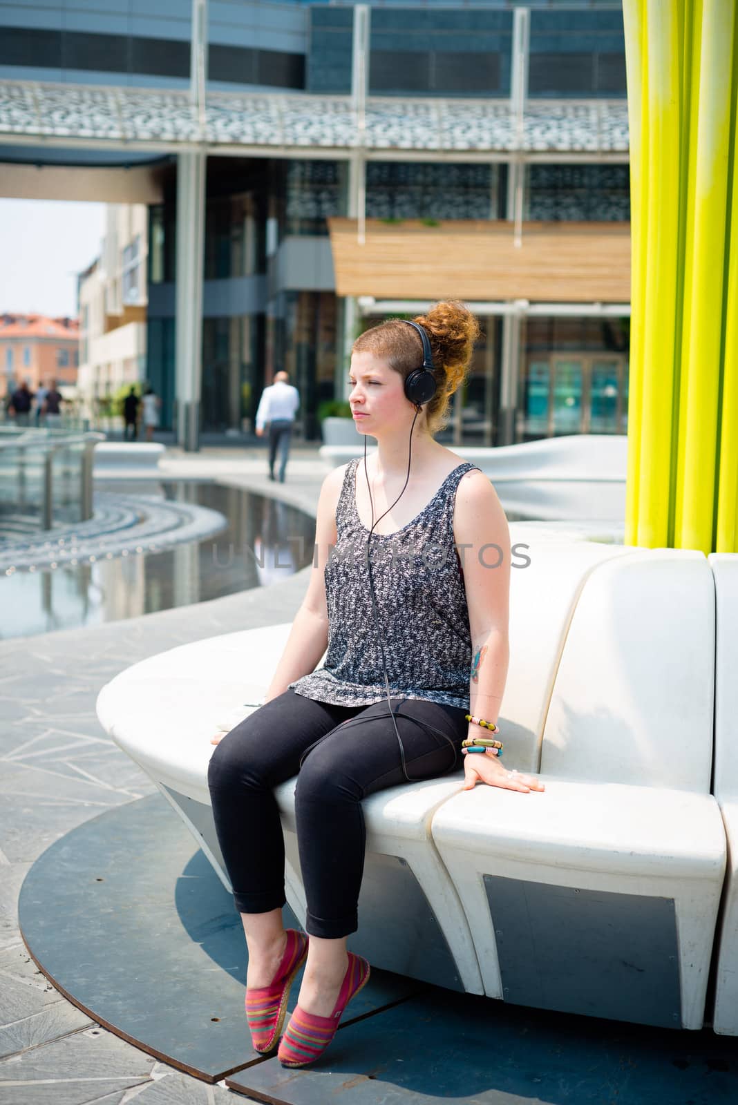 beautiful stylish modern young woman in the city