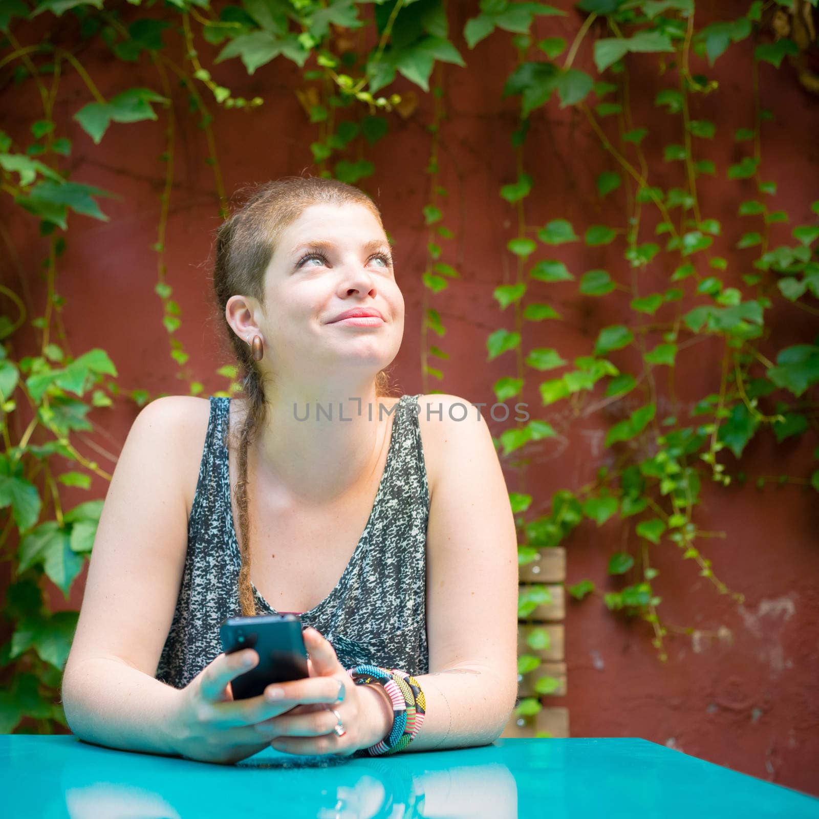 beautiful stylish modern young woman on the phone  by peus