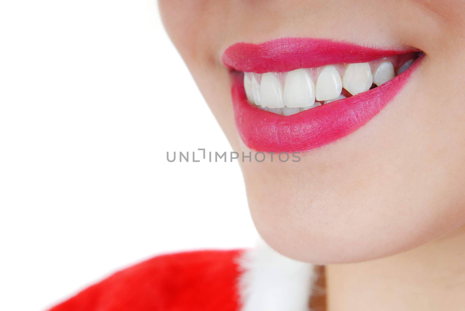 Close-up photo of the smiling woman with perfect healthy teeth