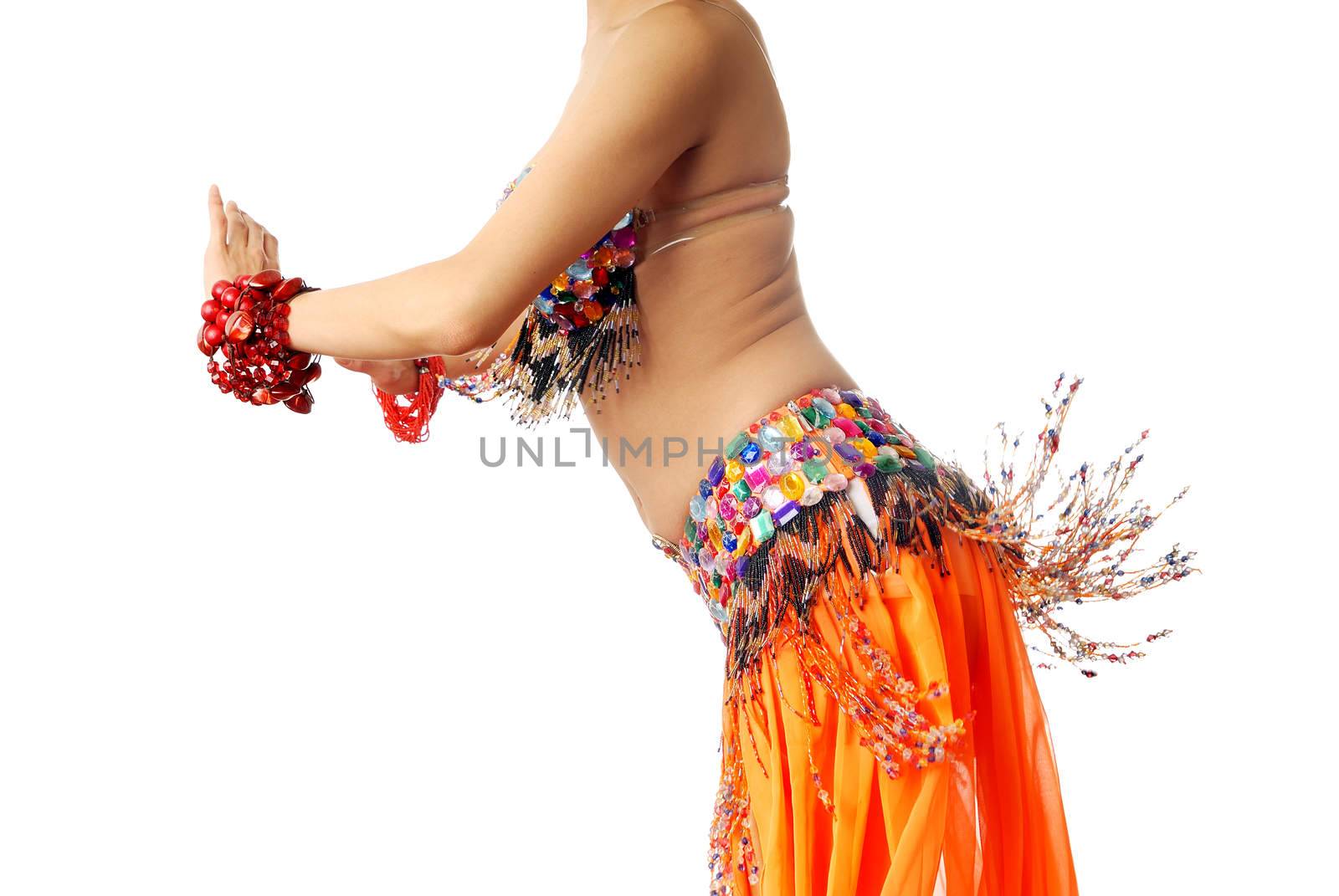 Side-view of the nifty belly-dancer on a white background