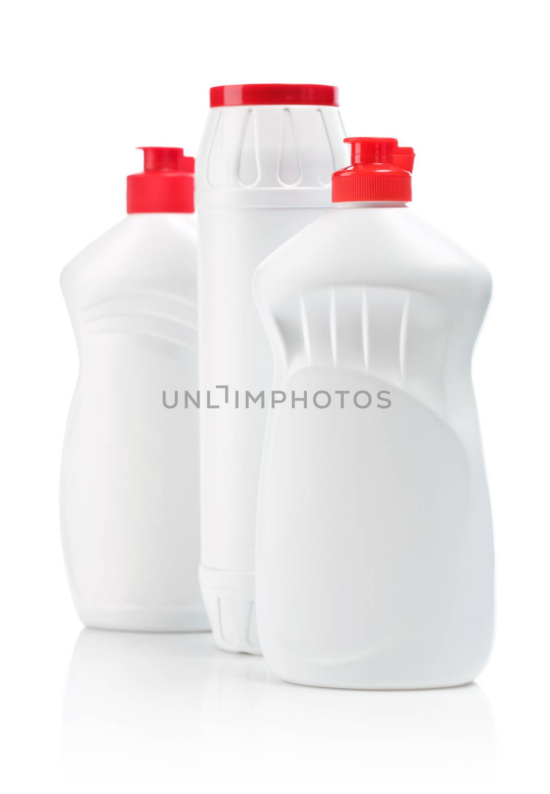 three white bottle for cleaning