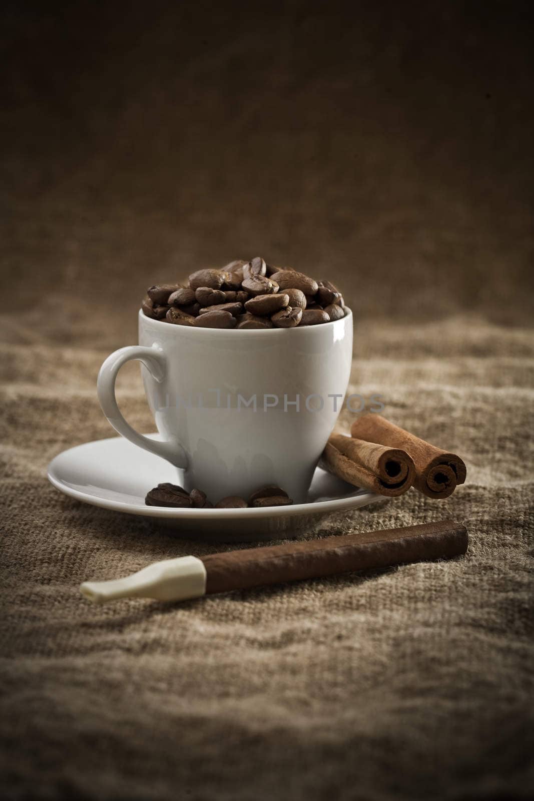 beans in cup and cigar