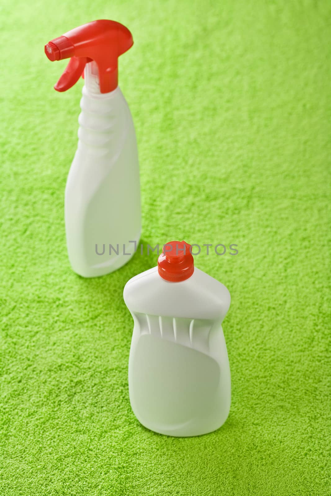 detergents on green background