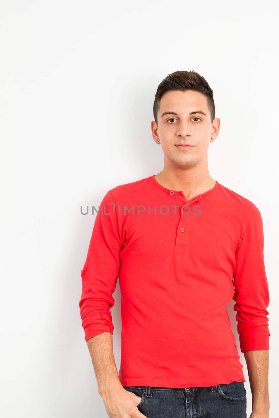 Young man against white background