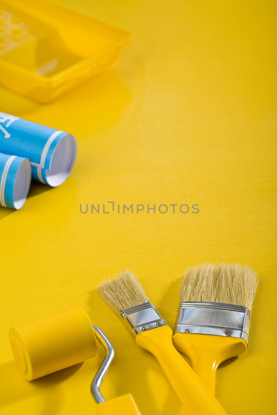 paint tools on yellow table