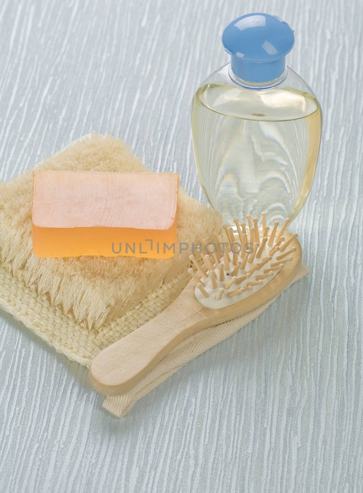 bottle hairbrush soap and bast