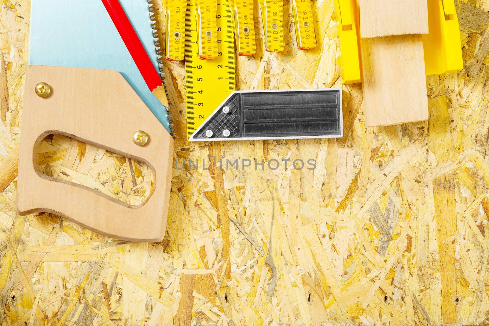carpentry tool set on plywood board