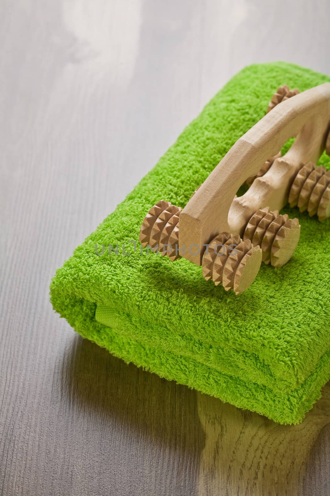 massager on green towel