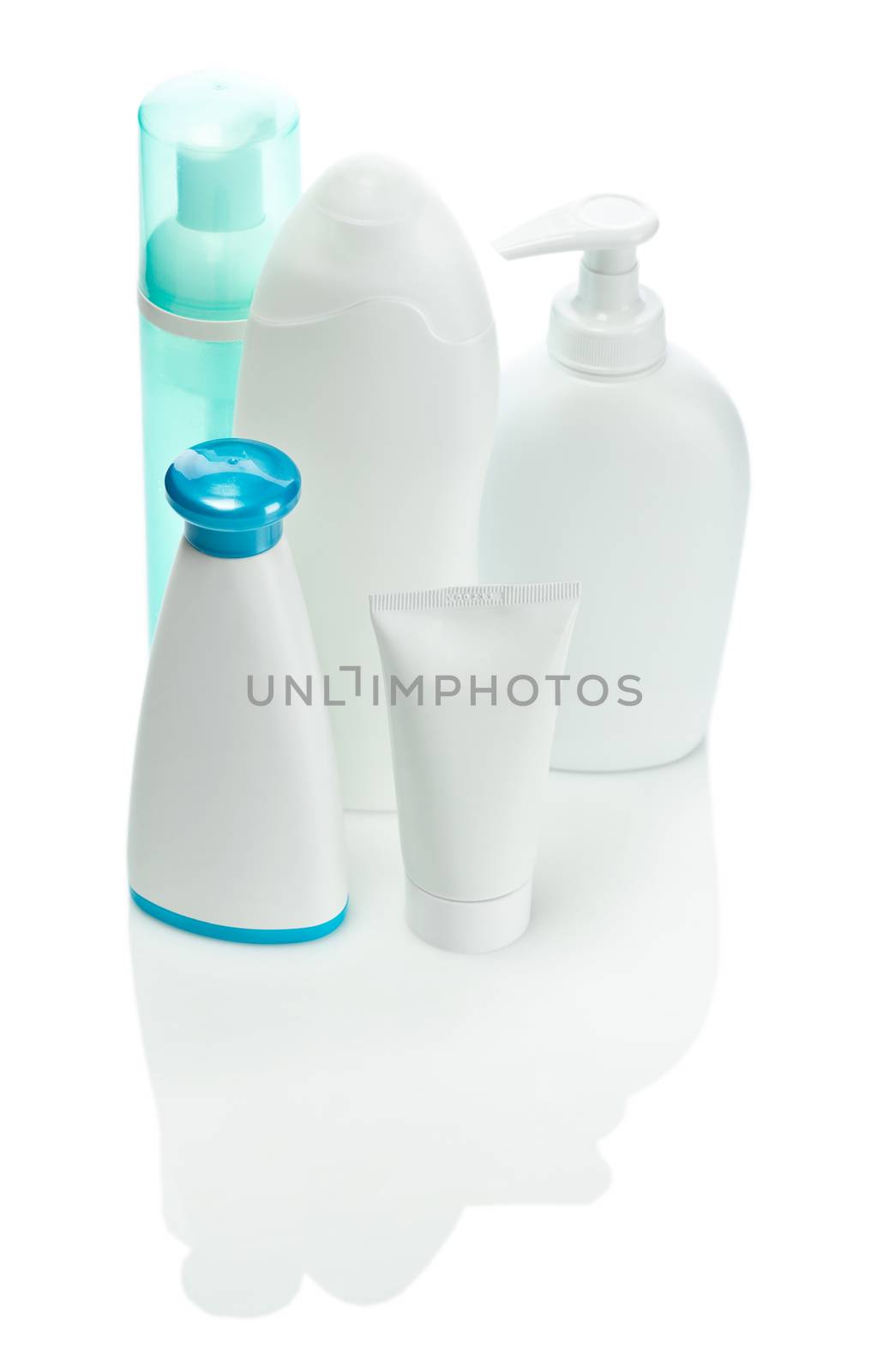 one green and three white care bottles