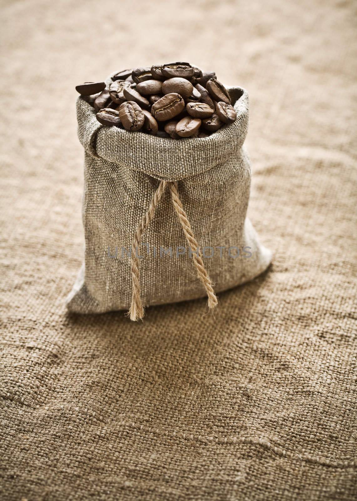 coffee grains in bag on sacking