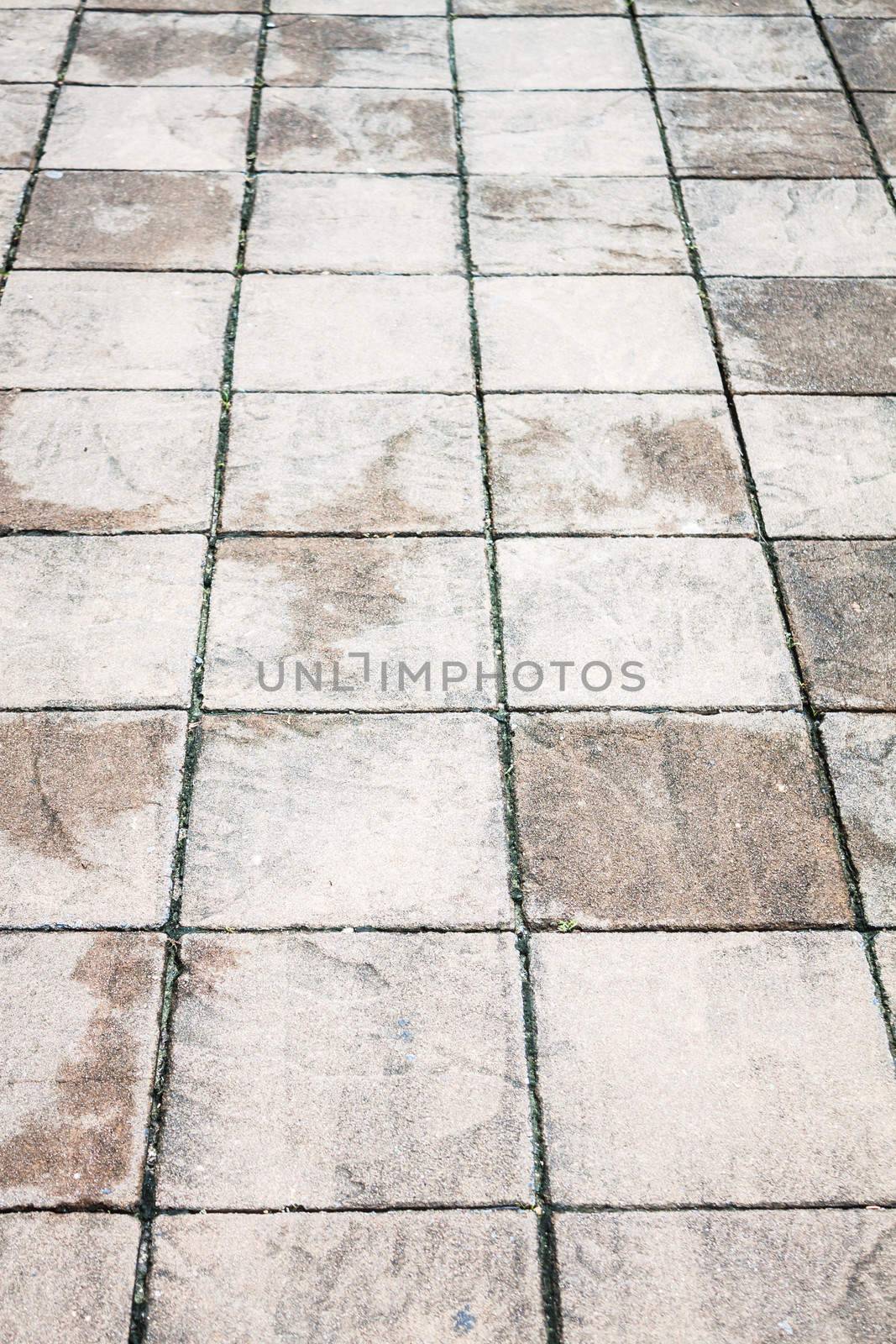 Wet walk way texture with stone plates  by punsayaporn