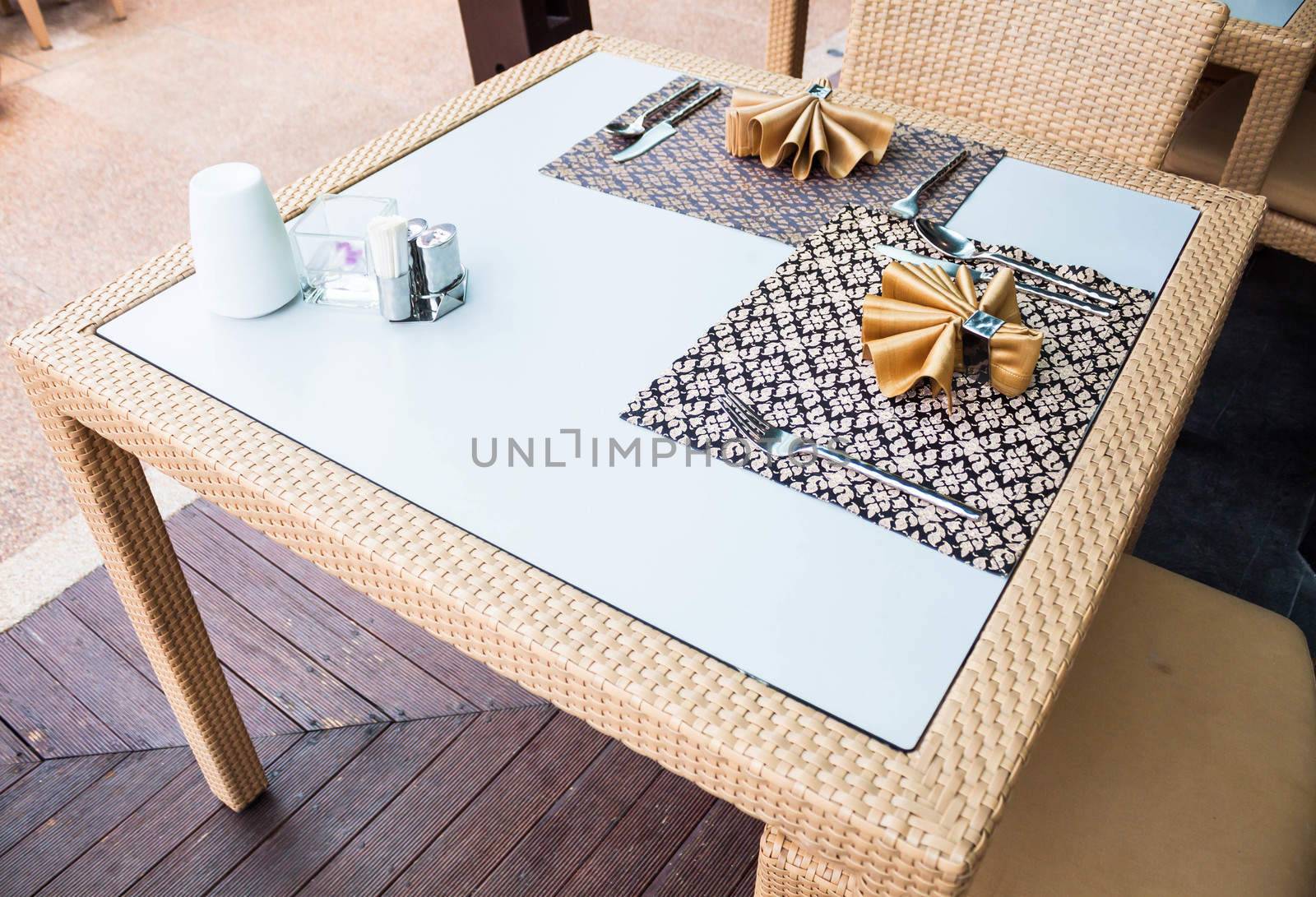 Set of oriental style dining table on wood floor by punsayaporn