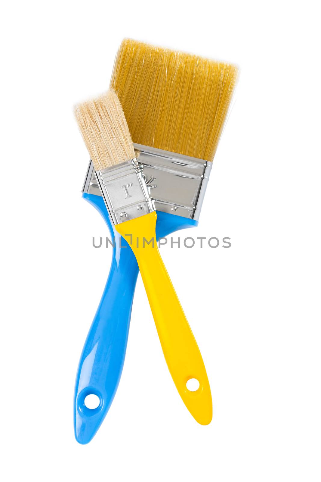 yellow and blue paintbrushes isolated