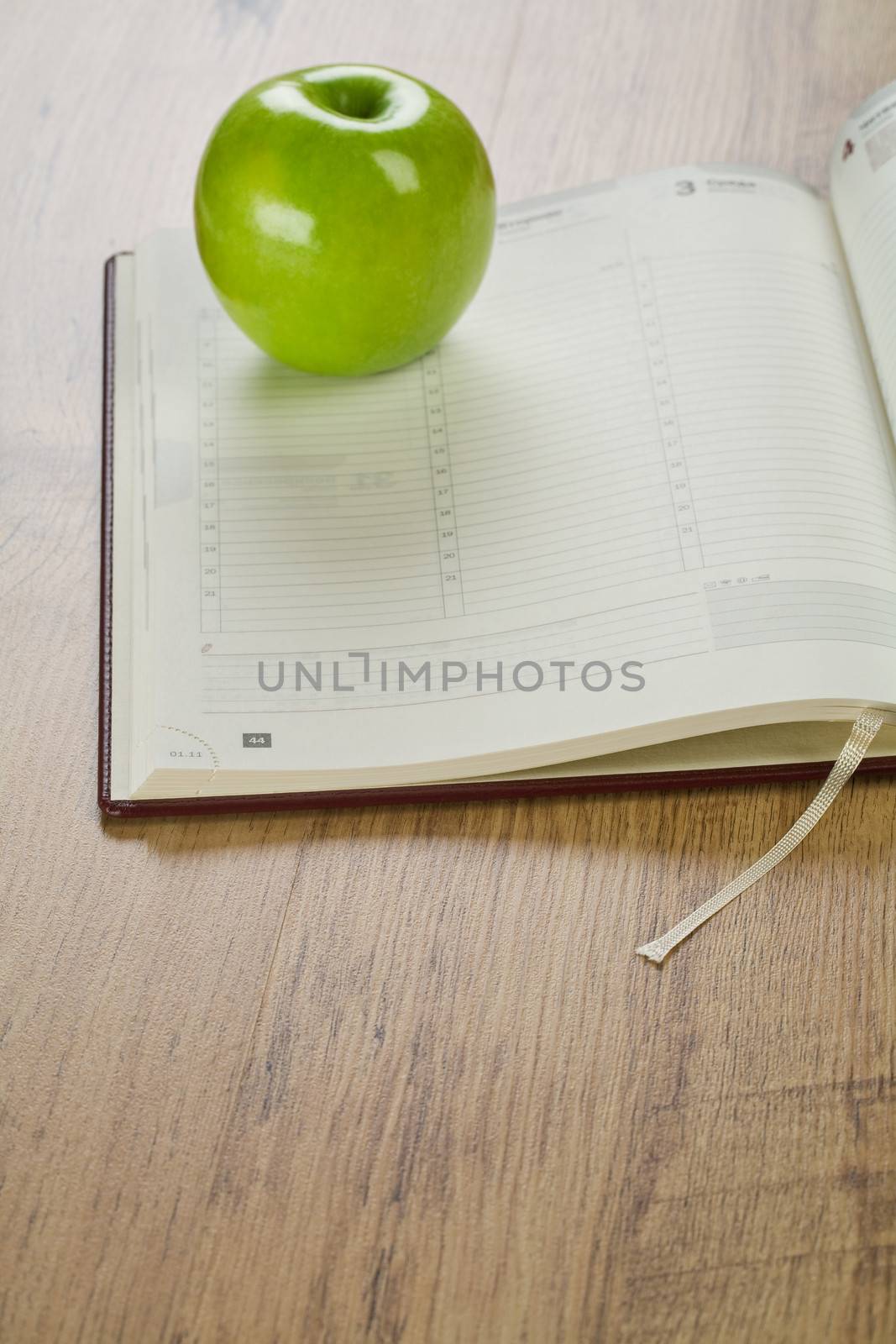 notebook with apple