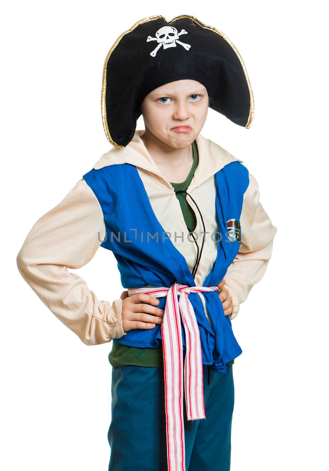 A boy pretending to be a grumpy pirate. Isolated on white.