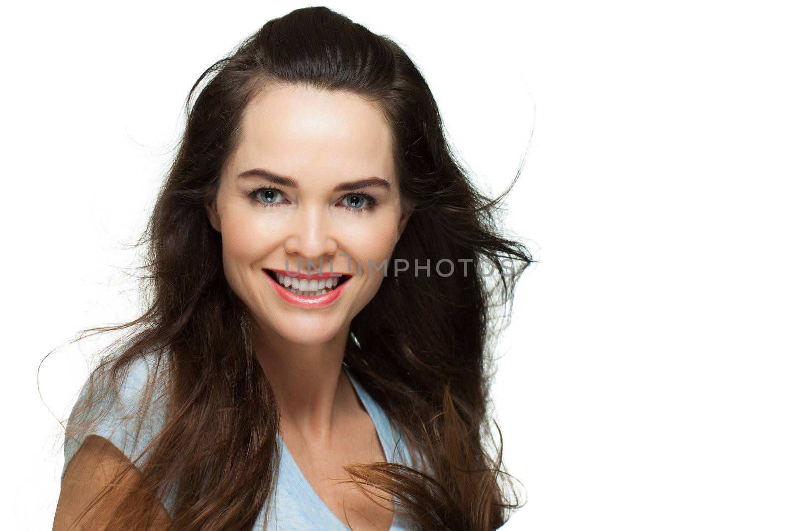 Portrait of a beautiful happy and natural woman. Isolated on white.