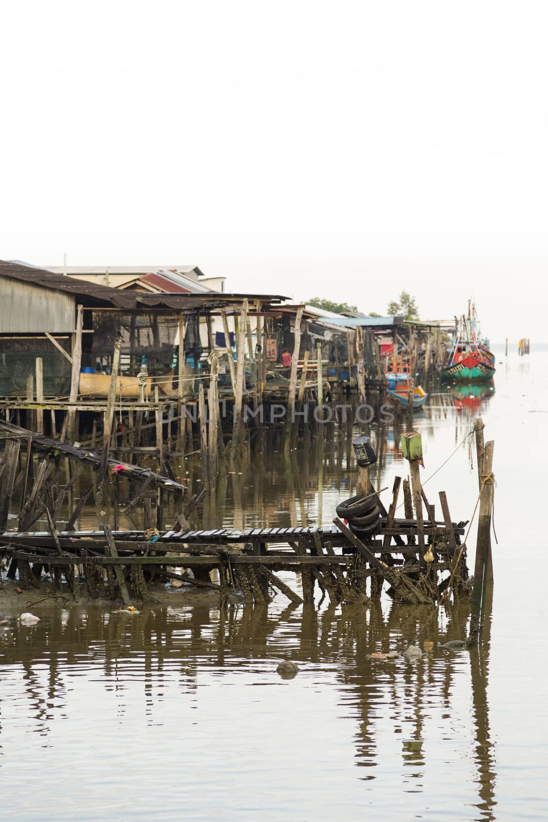 Sekinchan,Pahang/ Malaysia - 25 May 2013: Traditional Chinese Fishing Harbour on isolated white background