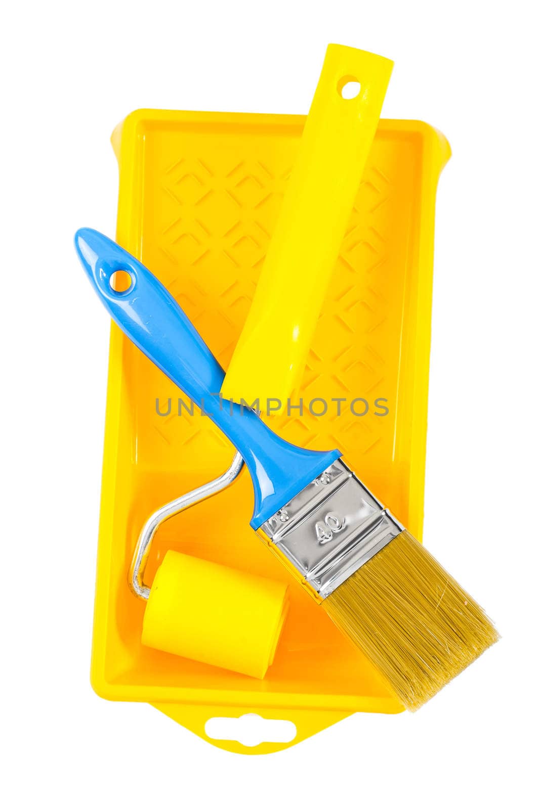 paintroller and paintbrush on paintbox
