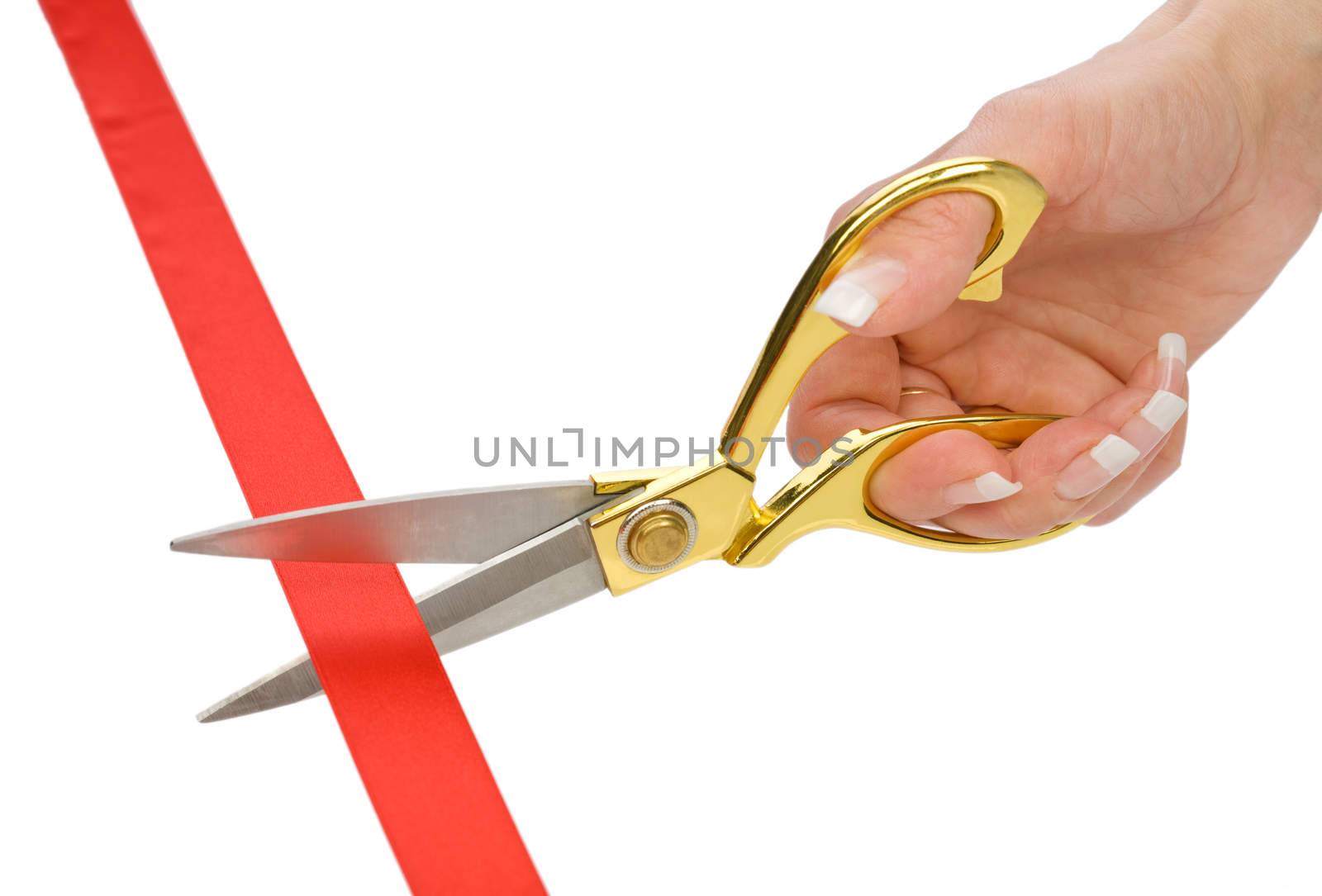 single female hand with Scissors and red tape