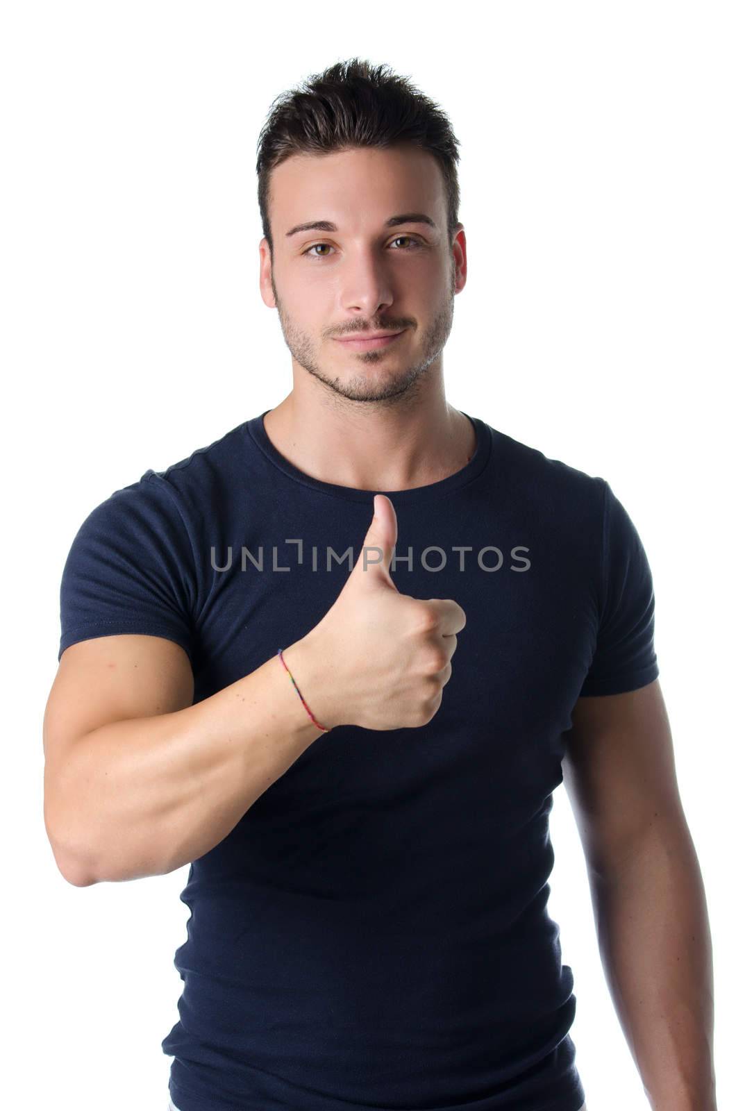 Handsome young man with thumb up doing OK sign by artofphoto