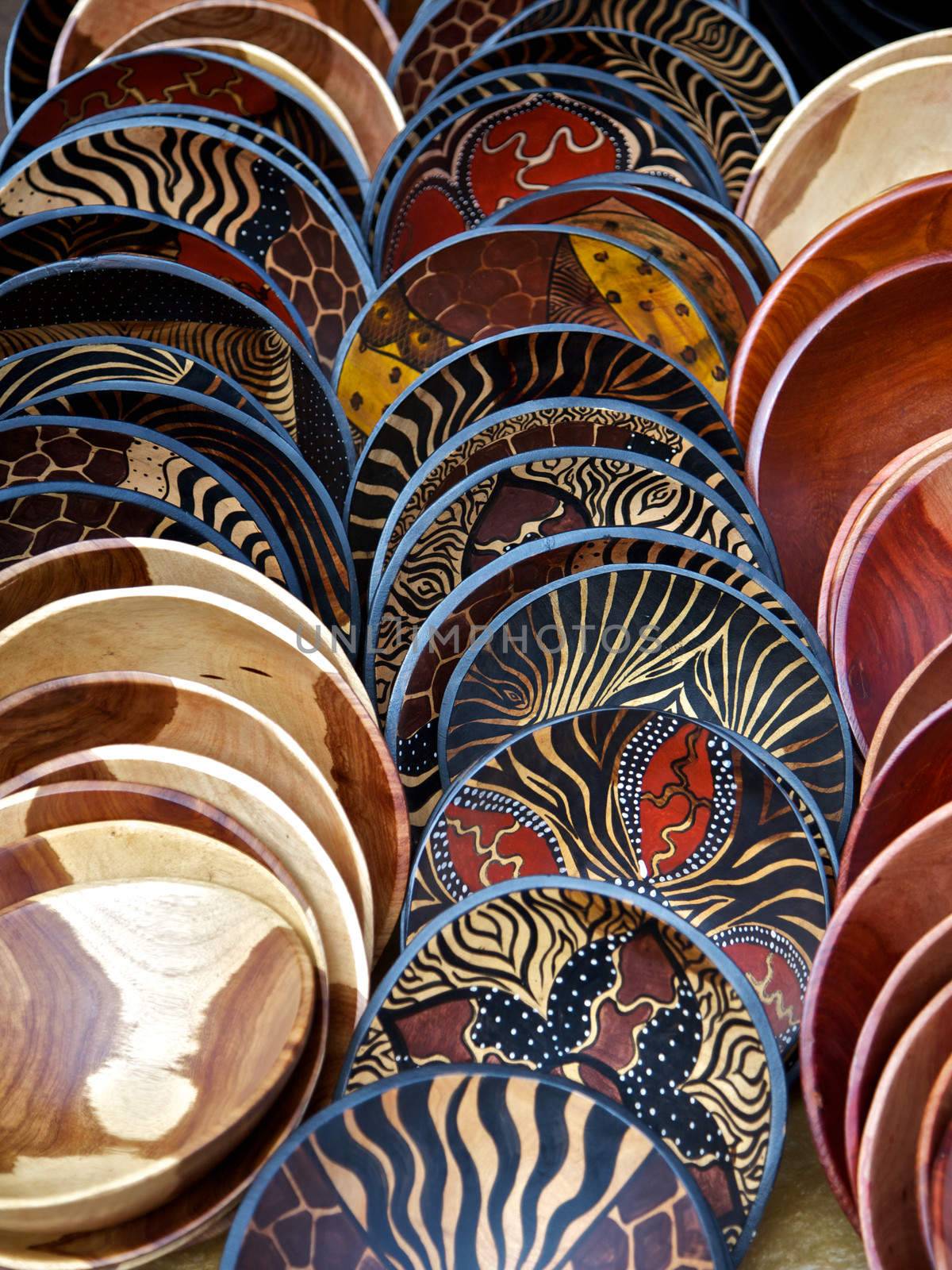 Painted wooden bowls in rows in South Africa