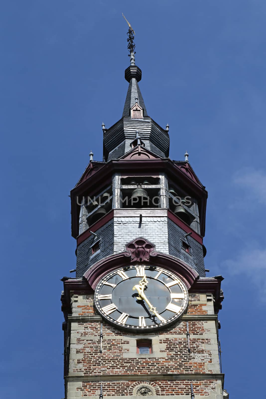 The town hall in the historical centre of Sint-Truiden, Belgium, with a 17th-century tower classified by UNESCO as a World Heritage Site in 1999. The oldest parts of the building date from the 13th century.