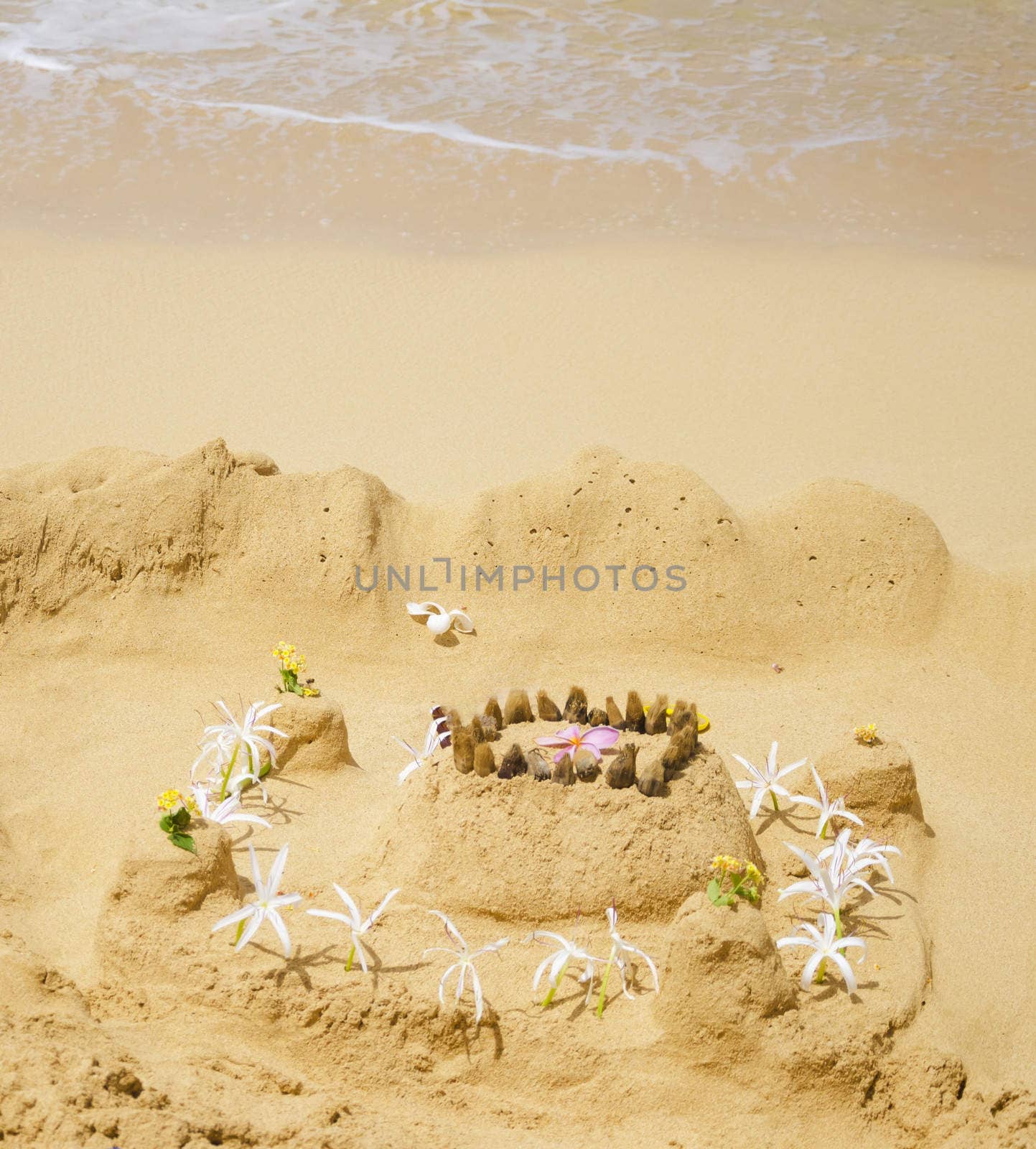 Sandy castle on the beach by EllenSmile