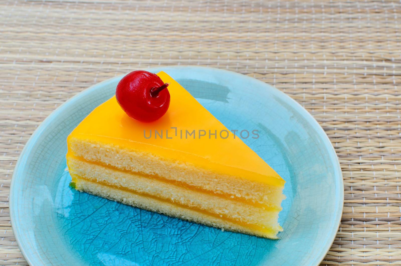 Orange cake in blue dish, Sweet dessert