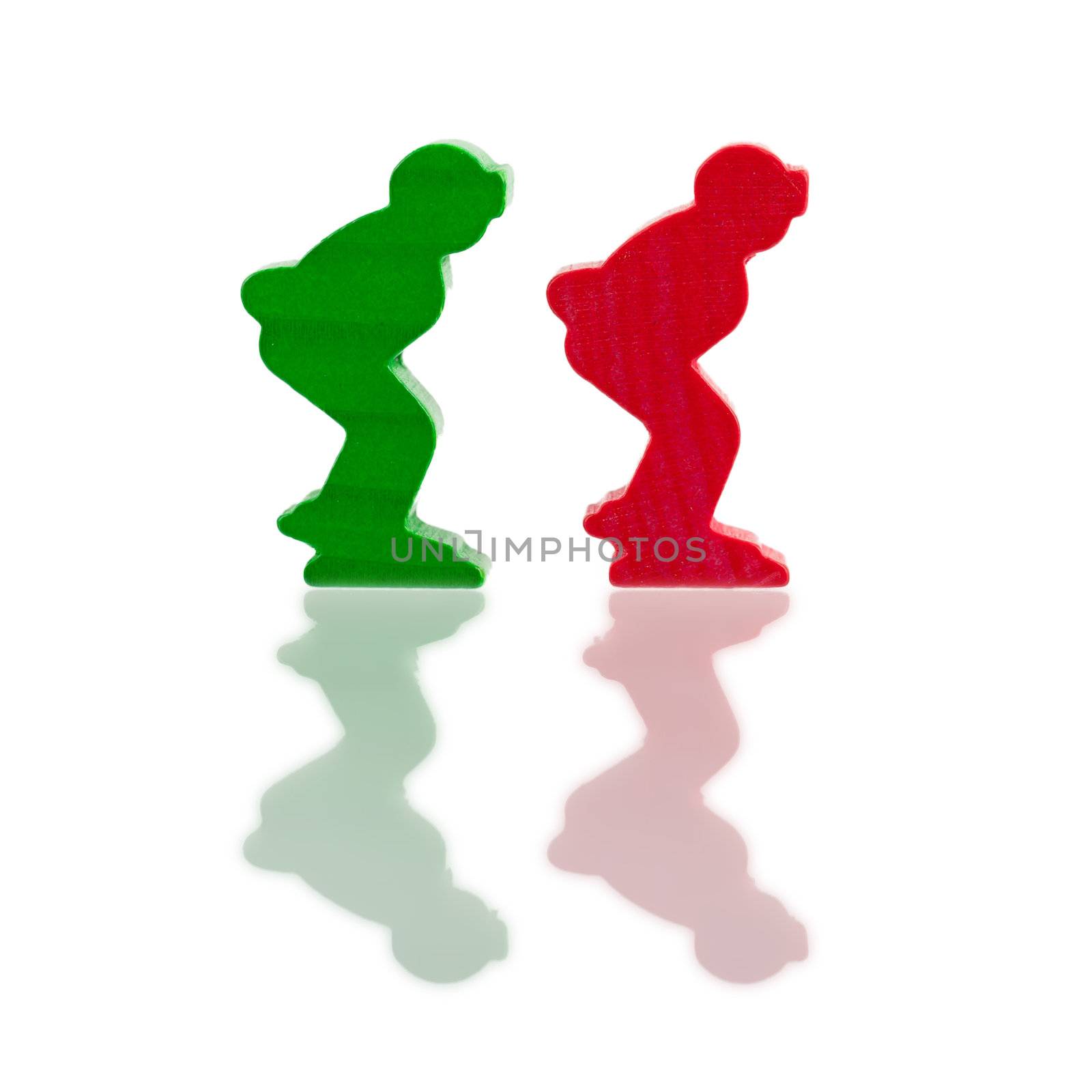 Two colored pawns isolated on a white background by michaklootwijk