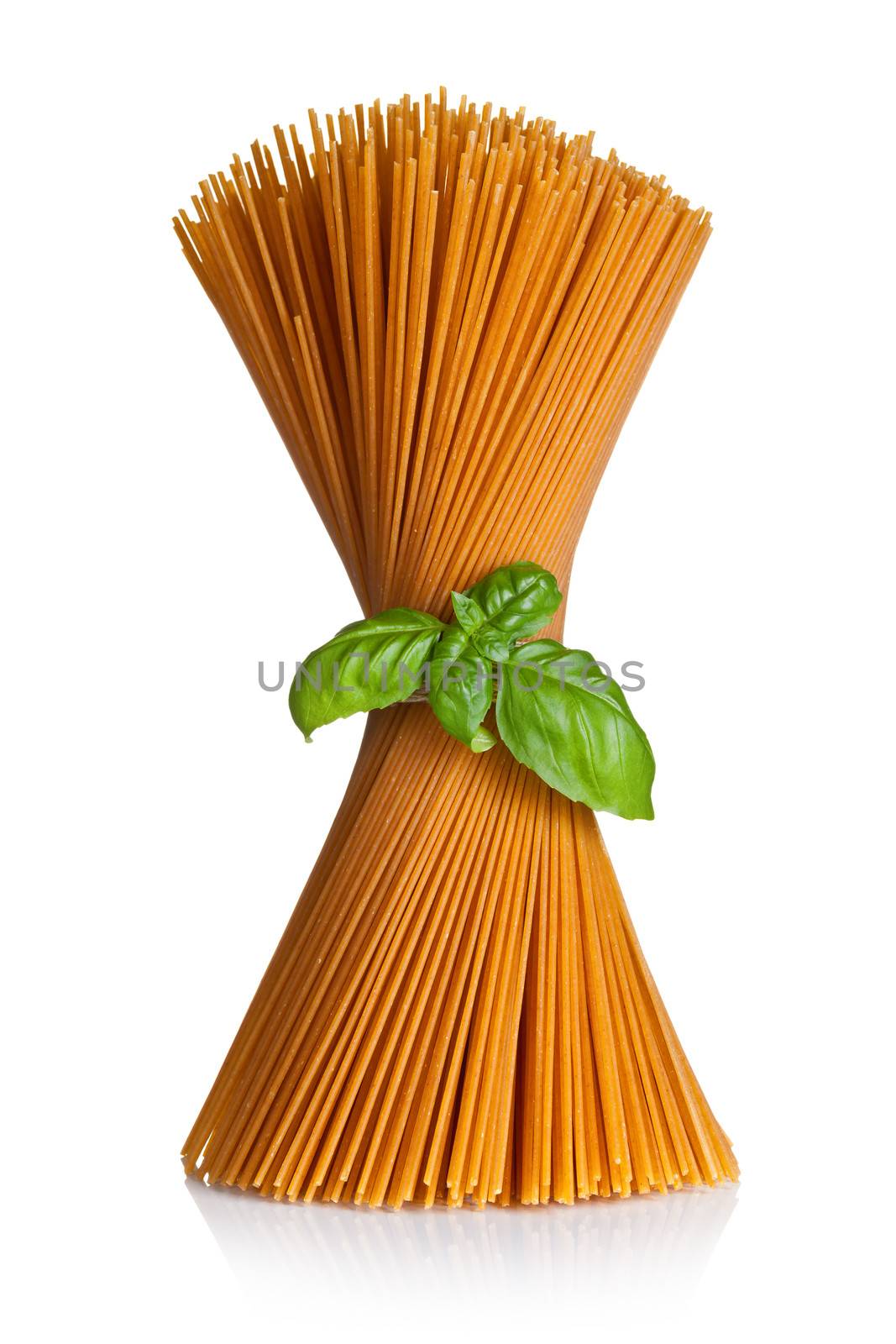 Spaghetti with basil isolated on white background. Bunch of whole wheat pasta 