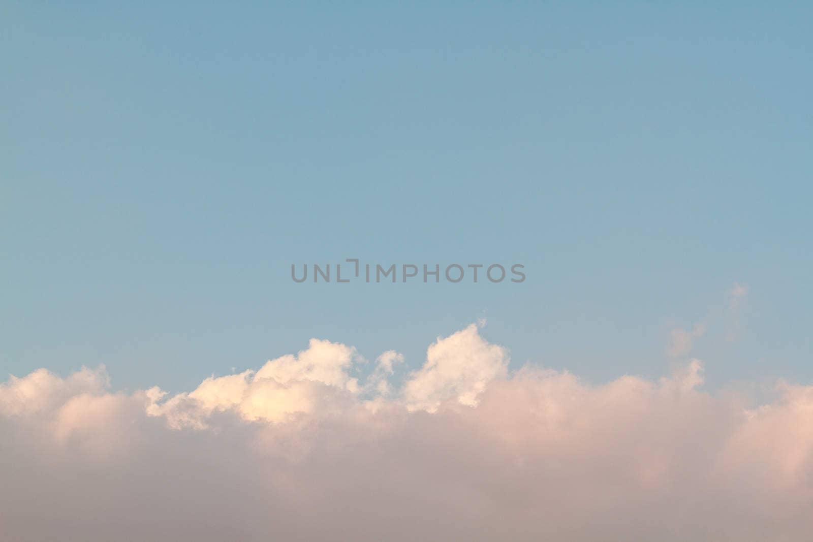 Blue sky with a white clouds for background