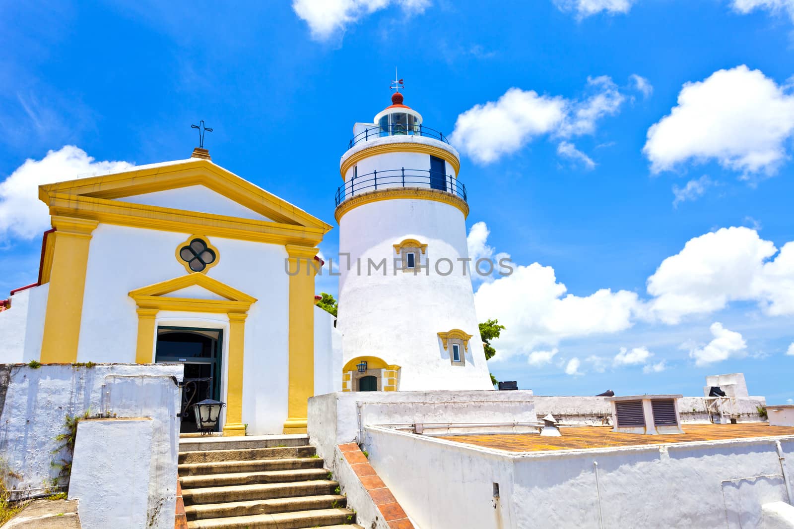 Light house and church in Macau, China.