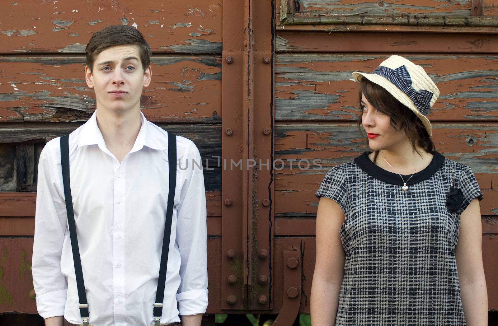 Retro young love couple vintage funny face industrial setting by alistaircotton