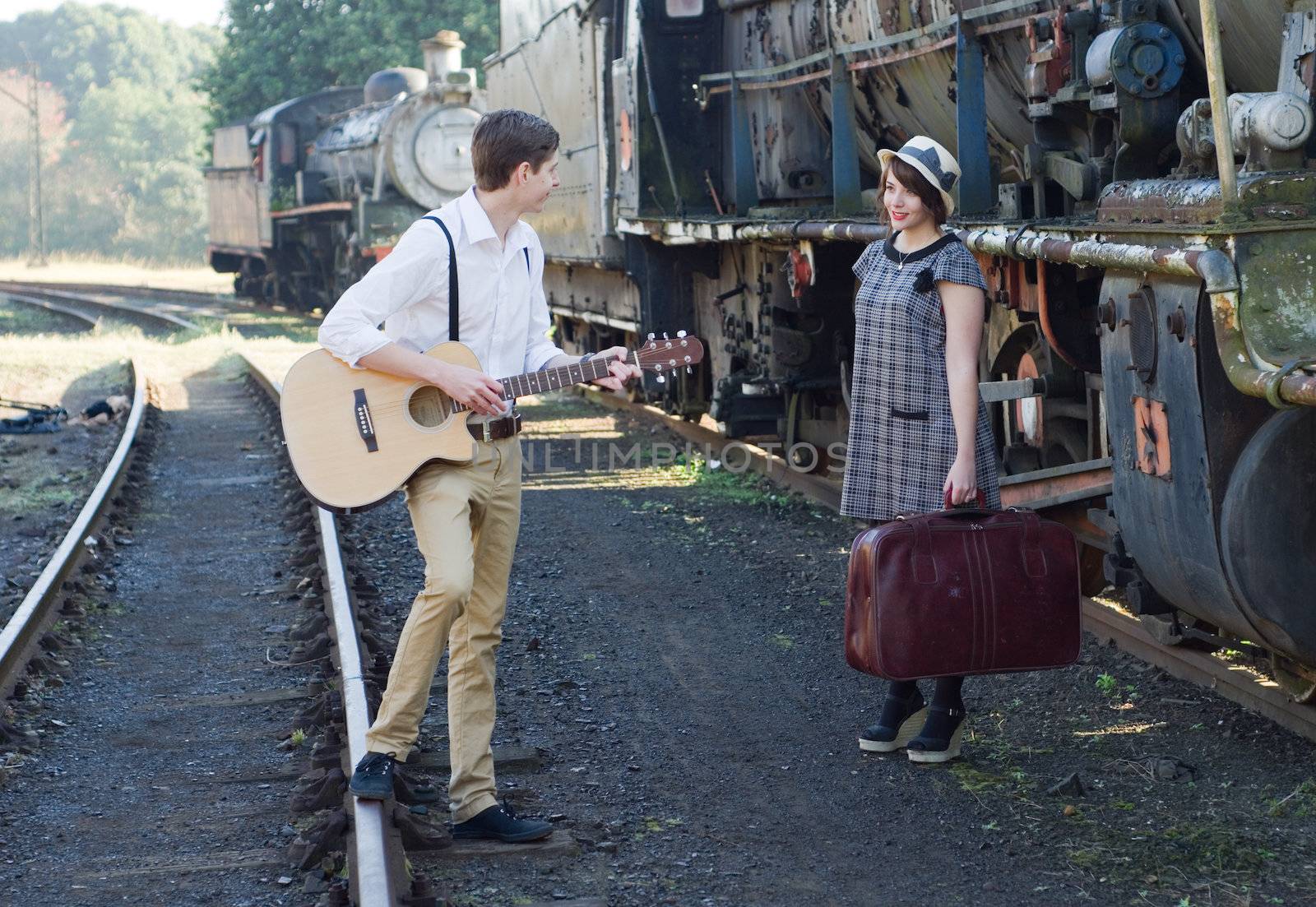 Retro young love couple vintage serenade train setting by alistaircotton