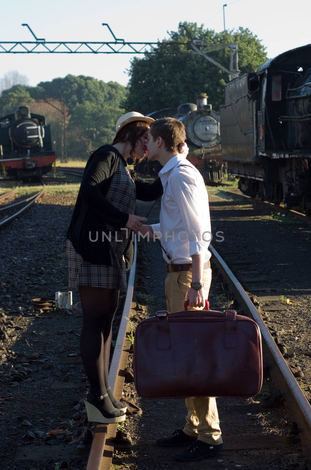 Retro hip hipster romantic love couple in vintage train setting
