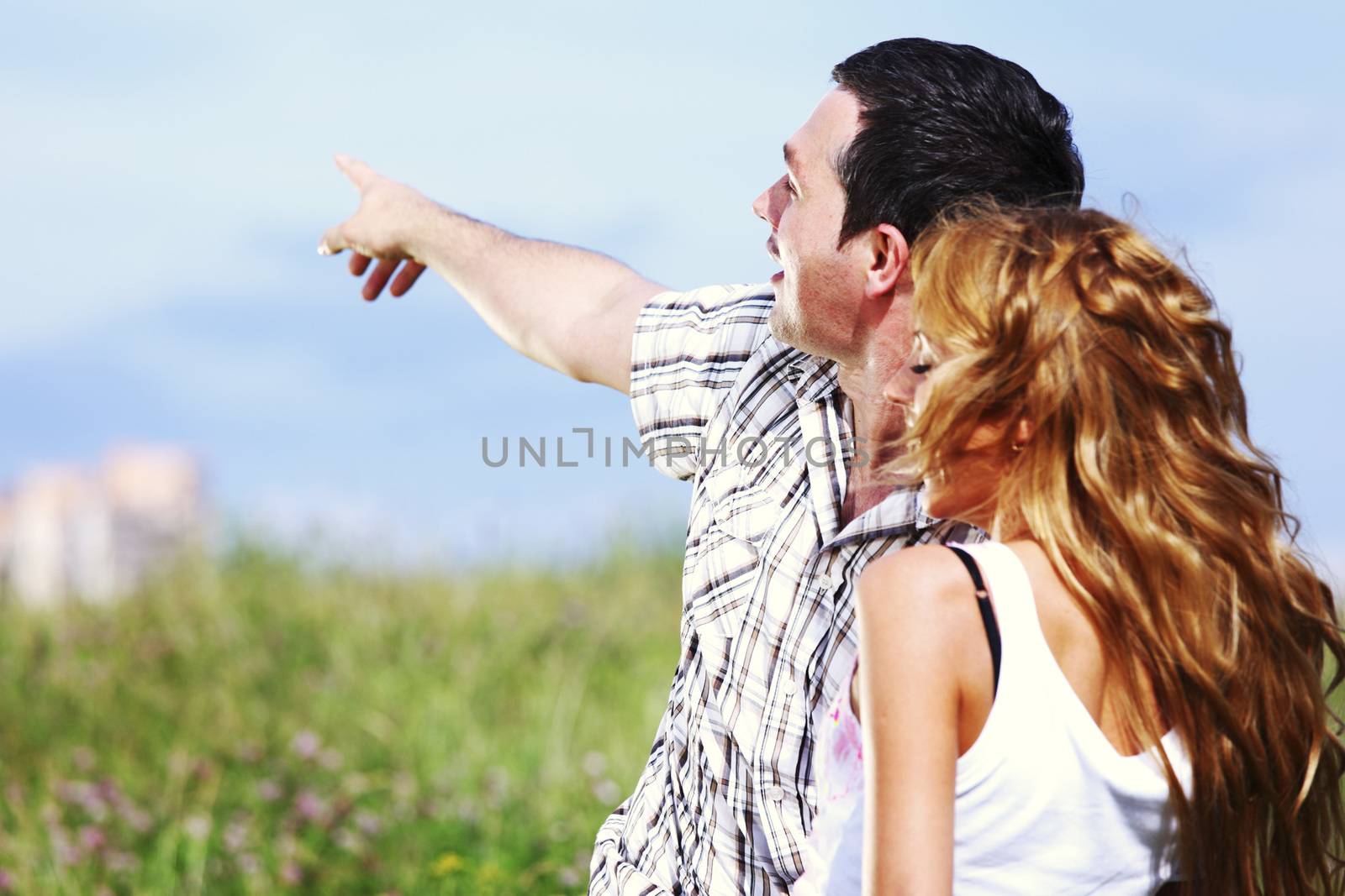 man and woman see houses and new flat