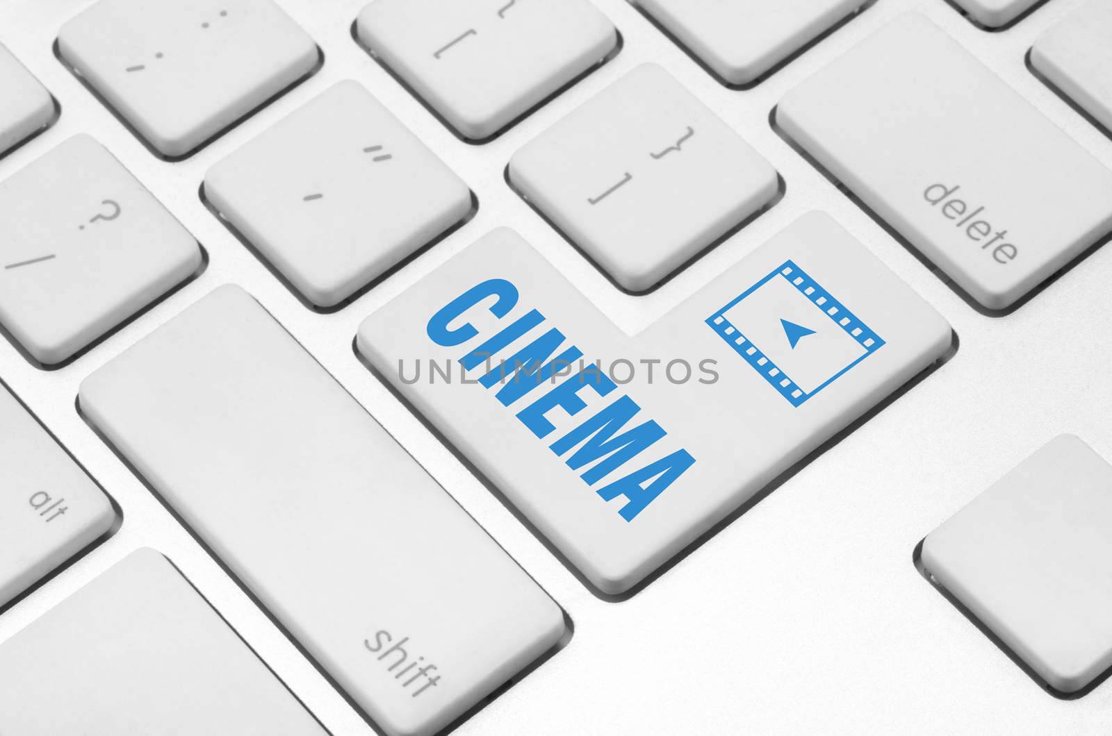 Business concept: Cinema key on the computer keyboard
