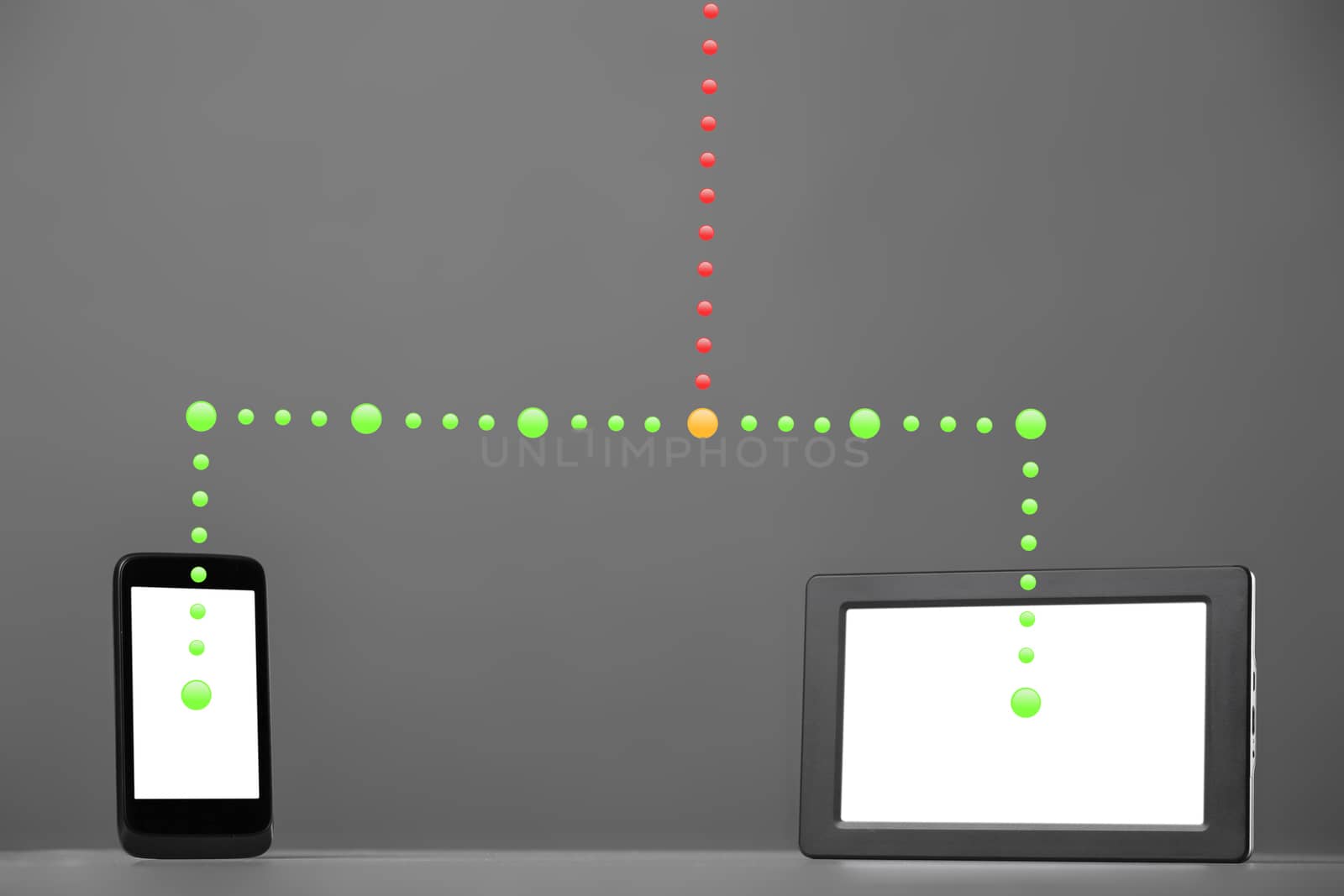 Smartphone and tablet computer on a gray background. Synchronization concept.