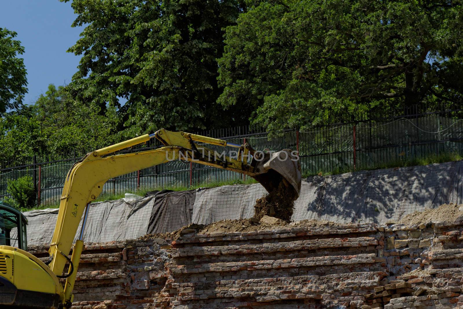 the excavator working on a construction site