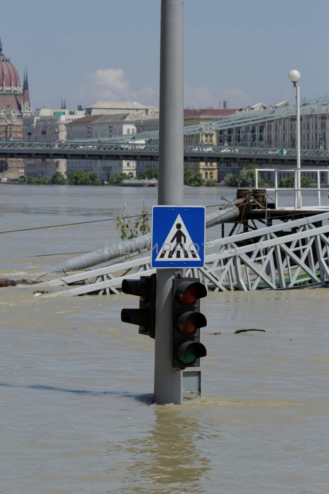traffic light on flooding river