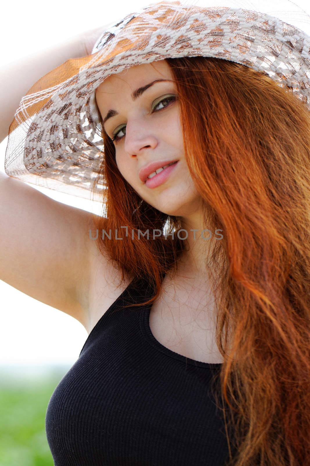 pretty young girl wearing a hat